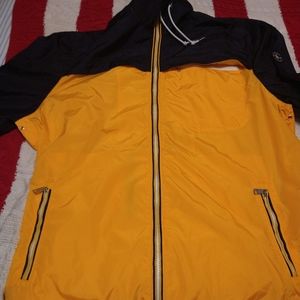 Beautiful New without Tag classic windbreaker,gold and blue with hoodie.